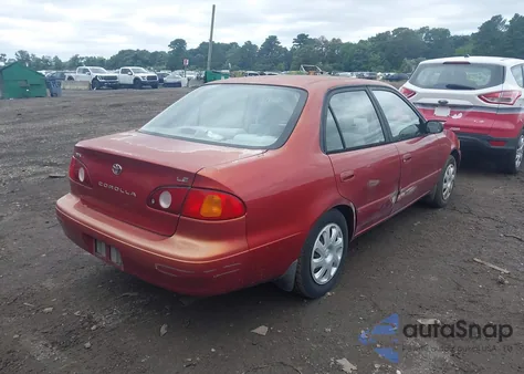 2002 Toyota Corolla Le z USA, uszkodzony, nr VIN 2T1BR12E22C530248